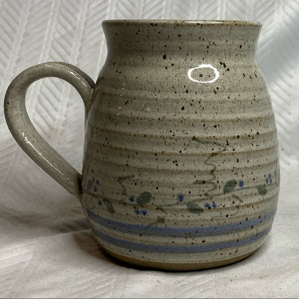 Glazed earthware pottery mug earth tone.